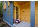 Inviting entry featuring a bright front door, wood accents, and charming flower pot at 160 Daphine Dr, Hillsborough, NC 27278