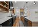 Well-appointed kitchen featuring modern appliances, ample counter space, and a sleek, functional design at 160 Daphine Dr, Hillsborough, NC 27278