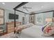 Spacious bedroom featuring a four-poster bed, ceiling fan, and a tasteful decor at 1813 Carrington Dr, Raleigh, NC 27615