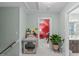 Hallway featuring a painted dog portrait, carpeted floor, and light walls at 1813 Carrington Dr, Raleigh, NC 27615
