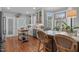 Bright kitchen featuring an island, stainless steel appliances, and bay window with a stained glass accent at 1813 Carrington Dr, Raleigh, NC 27615