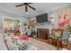 Cozy living room with fireplace, hardwood floors, and stylish decor at 1813 Carrington Dr, Raleigh, NC 27615