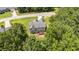 Aerial view of the home showcasing back of house with deck overlooking wooded backyard at 185 Keller Dr, Clayton, NC 27520