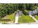 Beautiful aerial view of a two story home, manicured lawn, and driveway at 185 Keller Dr, Clayton, NC 27520