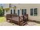 Backyard features a cozy wooden deck perfect for outdoor entertaining at 185 Keller Dr, Clayton, NC 27520