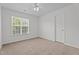 Bedroom featuring a window with natural light and a closet at 185 Keller Dr, Clayton, NC 27520