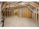 Unfinished attic space with exposed wooden beams and ductwork, ready for customization to create a unique living space at 188 Banner Elk Rd, Benson, NC 27504