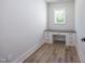 The office features built in desk with drawers and wood floors at 188 Banner Elk Rd, Benson, NC 27504