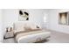 Nicely staged bedroom with modern furnishings, neutral bedding, and contemporary artwork at 198 Blue Butterfly Dr, Angier, NC 27501