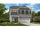 Charming two-story home featuring an attached two car garage and manicured lawn at 198 Blue Butterfly Dr, Angier, NC 27501