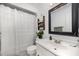 Well-maintained bathroom with a sleek vanity and shower with modern fixtures at 200 W Woodcroft Pkwy # 57B, Durham, NC 27713