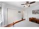 Comfortable bedroom with a ceiling fan, and a work desk, offering a peaceful retreat at 200 W Woodcroft Pkwy # 57B, Durham, NC 27713