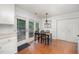 Charming dining area with patio access, perfect for indoor-outdoor entertaining at 200 W Woodcroft Pkwy # 57B, Durham, NC 27713