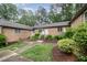 Well-maintained brick homes with landscaped yards, offering a charming and welcoming neighborhood setting at 200 W Woodcroft Pkwy # 57B, Durham, NC 27713