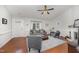 Inviting living room with vaulted ceilings, fireplace, modern furniture, and ample natural light at 200 W Woodcroft Pkwy # 57B, Durham, NC 27713