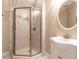 Bathroom with tiled shower and glass door at 203 Chilcott Ln, Apex, NC 27502