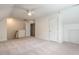 Spacious bonus room with neutral carpet, bright lighting, and easy access to other rooms at 203 Chilcott Ln, Apex, NC 27502