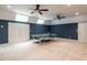 Recreation room featuring stylish two-tone paint, recessed lights, and space for activities at 203 Chilcott Ln, Apex, NC 27502