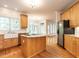 Modern kitchen with stainless steel appliances and granite countertops at 203 Chilcott Ln, Apex, NC 27502