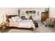 Inviting bedroom with plush carpeting and ample natural light from multiple windows at 203 Old Forest Creek Dr, Chapel Hill, NC 27514