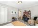 Well-lit bedroom featuring a desk and a cozy bed, perfect for relaxation at 203 Old Forest Creek Dr, Chapel Hill, NC 27514
