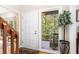 Bright foyer with a view to the outdoors through the sidelight at 203 Old Forest Creek Dr, Chapel Hill, NC 27514