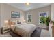 Bright bedroom featuring natural light, neutral tones, and soothing decor that creates a welcoming atmosphere at 208 Bridle Boast Rd, Cary, NC 27519