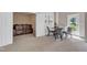 Comfortable dining area adjacent to media room at 208 Bridle Boast Rd, Cary, NC 27519