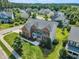 Stunning aerial view of the property showcasing its landscaped yard, mature trees, and neighborhood surroundings at 208 Bridle Boast Rd, Cary, NC 27519