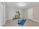 Workout room features a yoga mat, exercise ball, and accent decor for a motivating fitness space at 208 Bridle Boast Rd, Cary, NC 27519