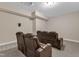 Home theater includes comfortable leather seating and a projector that ensures an immersive cinematic experience at 208 Bridle Boast Rd, Cary, NC 27519