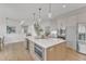 Spacious kitchen with a large island and stainless steel appliances at 208 Bridle Boast Rd, Cary, NC 27519