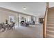 Spacious living area features a cozy fireplace, comfortable seating, and an abundance of natural light at 208 Bridle Boast Rd, Cary, NC 27519