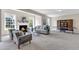 Inviting living room boasts a fireplace, comfortable seating, and ample space for relaxation and entertaining at 208 Bridle Boast Rd, Cary, NC 27519
