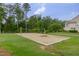 Outdoor volleyball court for residents to enjoy, set in a green, park-like setting at 208 Bridle Boast Rd, Cary, NC 27519