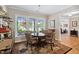 Cozy breakfast nook features a table for four and bright, natural light at 211 Ibis Ln, Durham, NC 27703