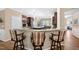 Open concept kitchen with a breakfast bar and sightlines to dining area at 211 Ibis Ln, Durham, NC 27703