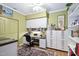 Home office featuring custom cabinetry, a desk, and a comfortable workspace at 211 Ibis Ln, Durham, NC 27703