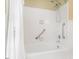 Clean white bathroom with shower, grab bars, and a shower curtain at 2228 Walker Ave, Burlington, NC 27215