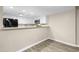 Bright kitchen with white cabinets, granite countertops, and modern appliances at 2233 Alpine Rd, Durham, NC 27707