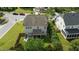 Aerial view showcases the home's layout, backyard, patio, and landscaping at 2361 Rainy Lake St, Wake Forest, NC 27587