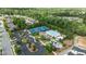 Aerial view of community amenities featuring a pool, tennis courts, clubhouse, and playground at 2361 Rainy Lake St, Wake Forest, NC 27587