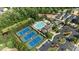 Aerial view of community amenities including a pool, tennis courts, clubhouse, and playground at 2361 Rainy Lake St, Wake Forest, NC 27587