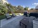 Spacious backyard featuring a well-maintained lawn, patio furniture, and an outdoor grill for summer barbecues at 2361 Rainy Lake St, Wake Forest, NC 27587