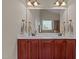 Large double sink vanity features decorative mirrors, lighting and hardware at 2361 Rainy Lake St, Wake Forest, NC 27587