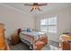 Bedroom features ceiling fan, neutral paint and carpet at 2361 Rainy Lake St, Wake Forest, NC 27587