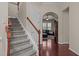 Welcoming foyer with hardwood floors and staircase, leading to the main living area at 2361 Rainy Lake St, Wake Forest, NC 27587