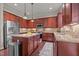 Well-equipped kitchen features stainless steel appliances, granite counters and ample storage at 2361 Rainy Lake St, Wake Forest, NC 27587