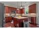 Updated kitchen with granite countertops, stainless appliances and cherry cabinets at 2361 Rainy Lake St, Wake Forest, NC 27587