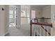 Upstairs landing with carpet floors and railings, with views to rooms at 2361 Rainy Lake St, Wake Forest, NC 27587